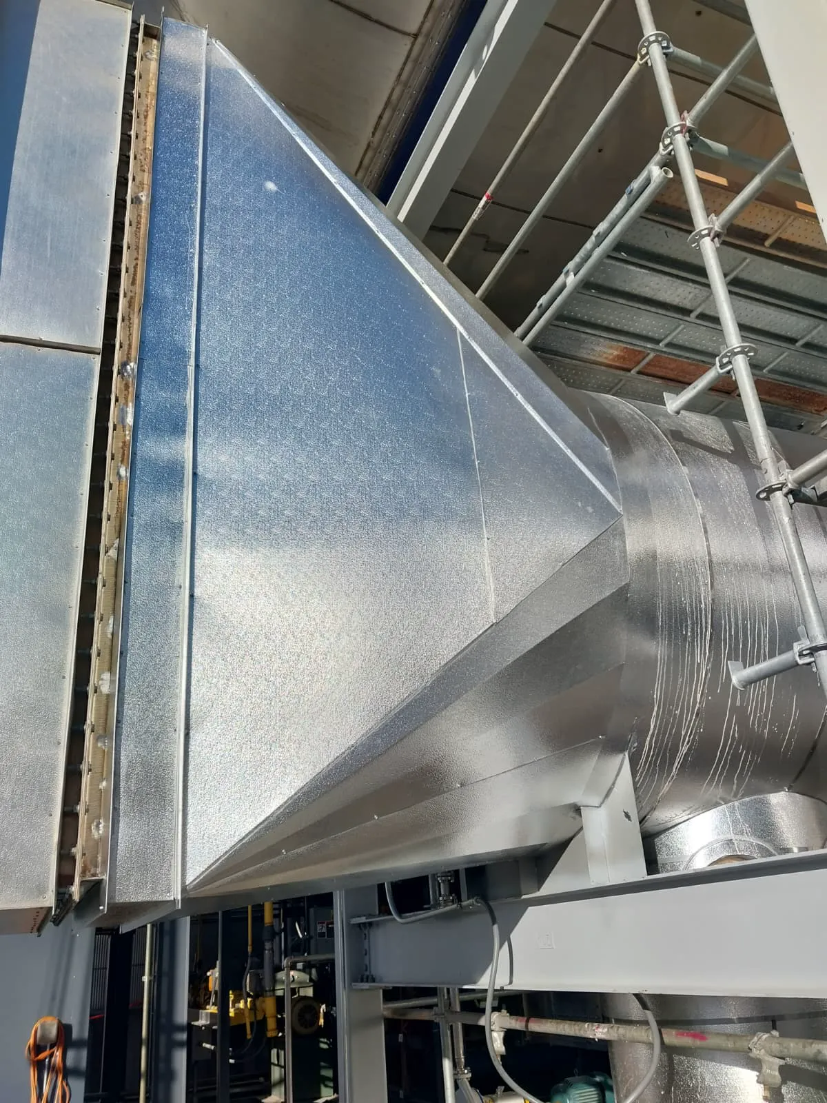 Newly installed duct transition on process equipment